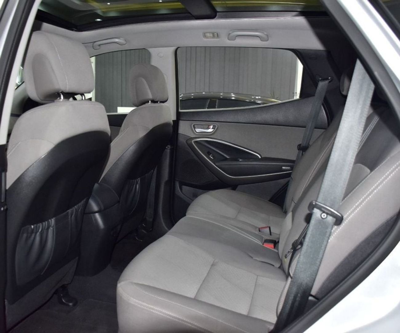 Hyundai Santa Fe EXCELLENT DEAL for our Hyundai SantaFe 4WD V6 ( 2016 Model ) in Silver Color GCC Specs