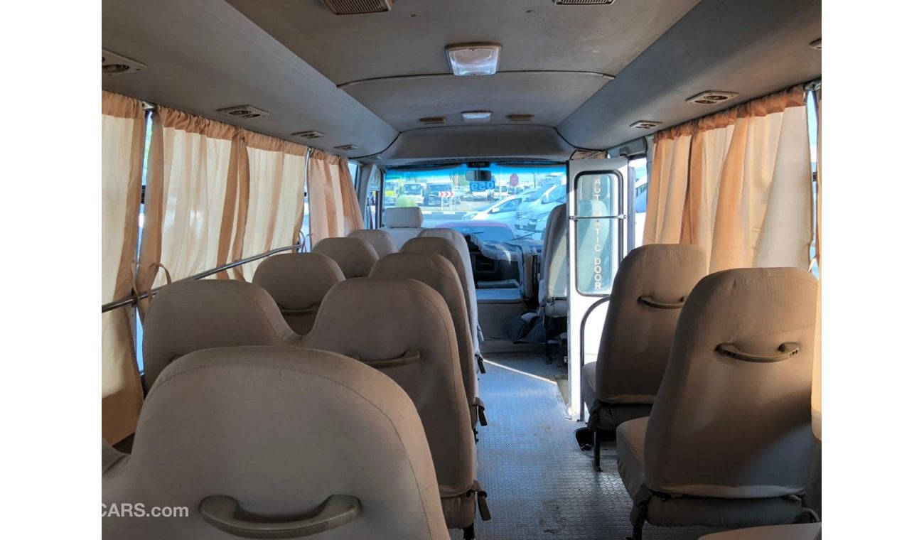 Toyota Coaster 4.2L Diesel, DVD + Rear Camera, Manual, MP3 Interface, DVD, CD Player, Tuner Radio, PARA ANGOLA