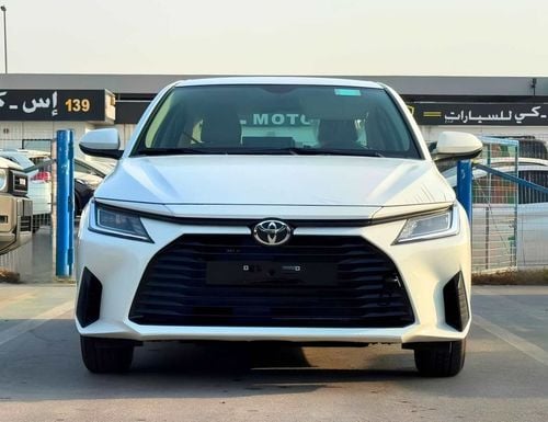 تويوتا يارس E  STANDRAD OPTION || 1.5L PETROL V4 | FABRIC SEATS | DVD | REAR PARKING SENSOR (CODE # YREO)