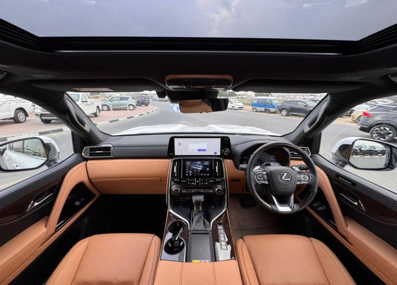 Lexus LX600 Lexus LX 600 twin turbo Model 2025 fuel petrol cylinder 6 white colour outside and interior orange