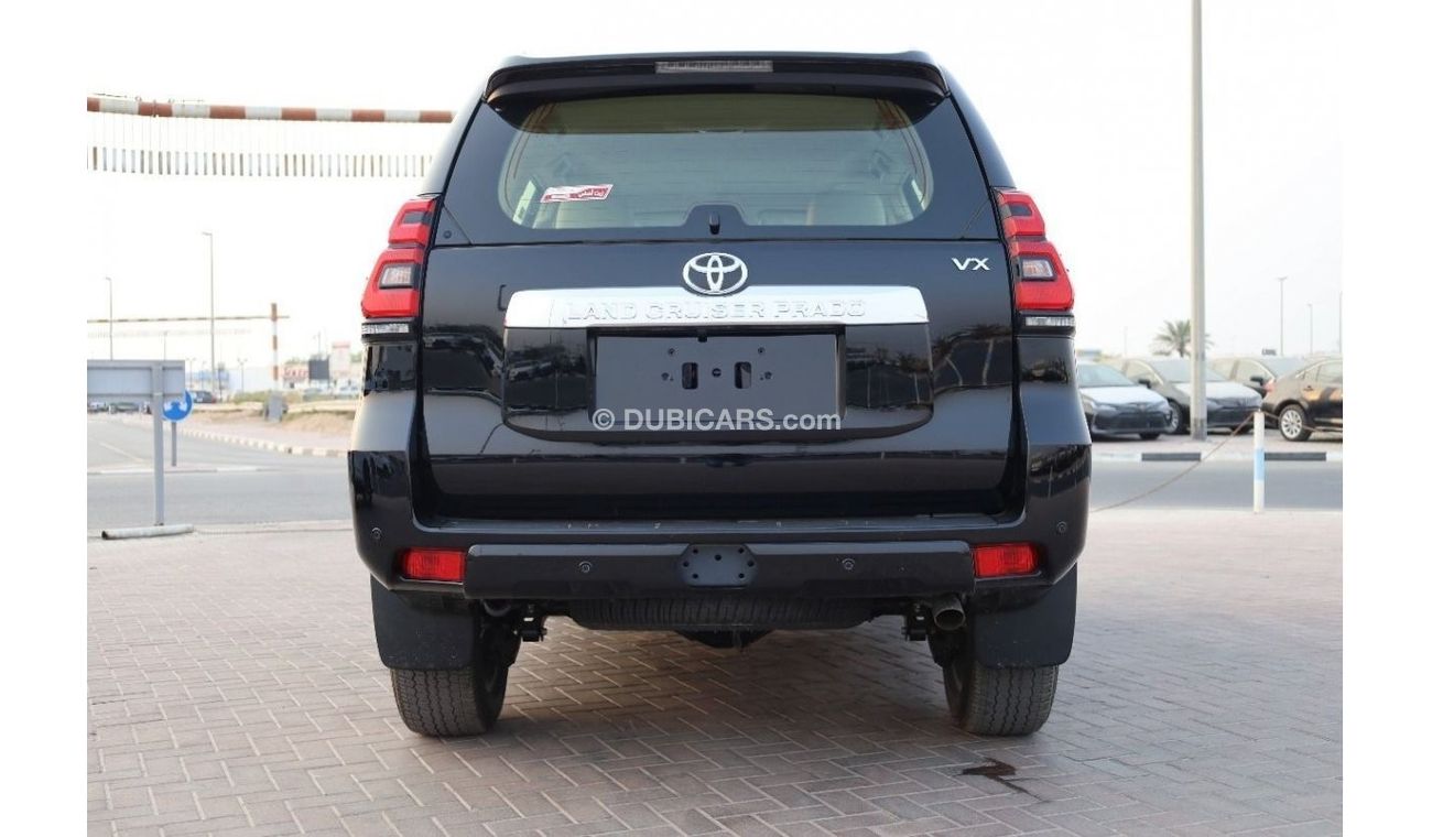 Toyota Prado TOYOTA_PRADO_4.0_VX1_2023_GASOLINE_GCC_BLACK_COOLBOX_7SEATS_FULL_OPTIONS