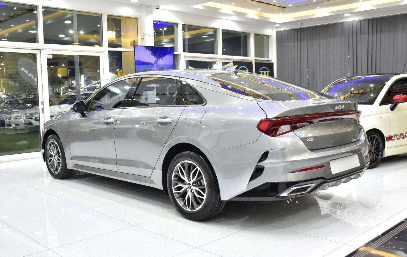 Kia K5 EXCELLENT DEAL for our KIA K5 ( 2023 Model ) in Silver Color GCC Specs