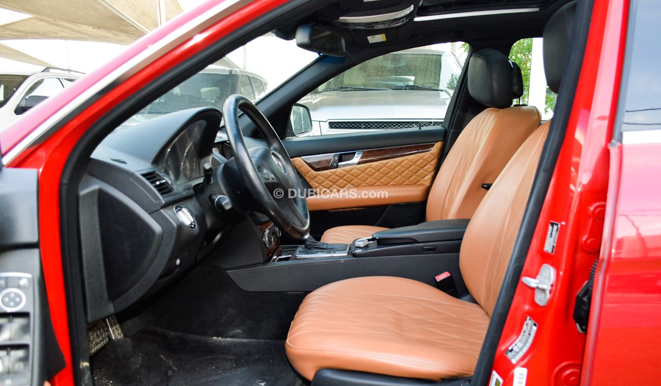 Mercedes Benz C300 C300 2009 model red color imported number one panorama leather and cruise control