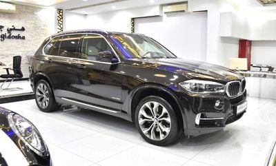 BMW X5 EXCELLENT DEAL for our BMW X5 xDrive50i ( 2014 Model ) in Brown Color GCC Specs