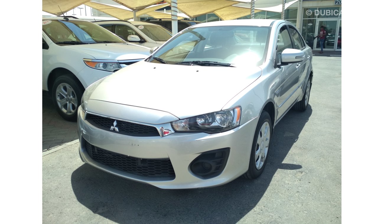 Mitsubishi Lancer 2016 SILVER GCC NO ACCIDENT NO PAIN PERFECT