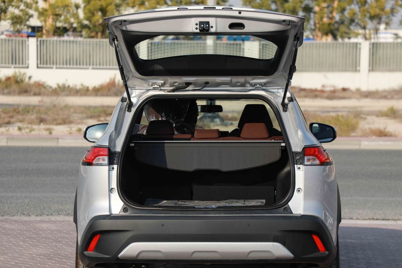 تويوتا كورولا كروس 1.8 Hybrid MID - Silver inside Red | Export Only