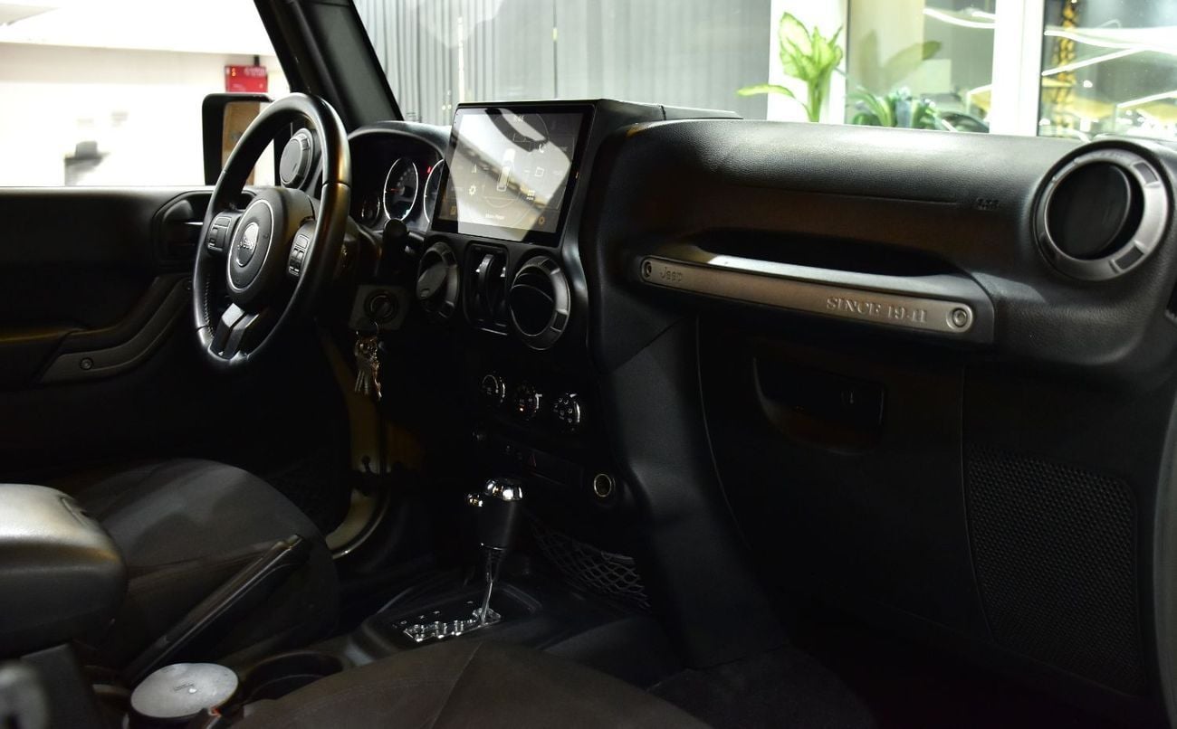 Jeep Wrangler SPORT EXCELLENT DEAL for our Jeep Wrangler Sport ( 2017 Model ) in Beige Color GCC Specs