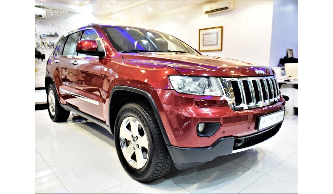 Jeep Grand Cherokee ONLY 66000 KM! Jeep Grand Cherokee 2013 Model! In Red Color! Gcc Specs