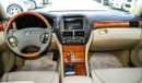 Lexus LS430 Imported 1/2 Ultra 2006 model, white color, leather opening, wooden wheels, electric mirrors, electr