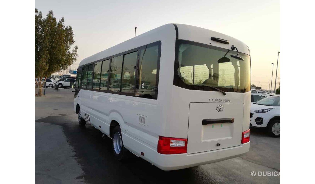 Toyota Coaster 23 seats High Roof Diesel full Option