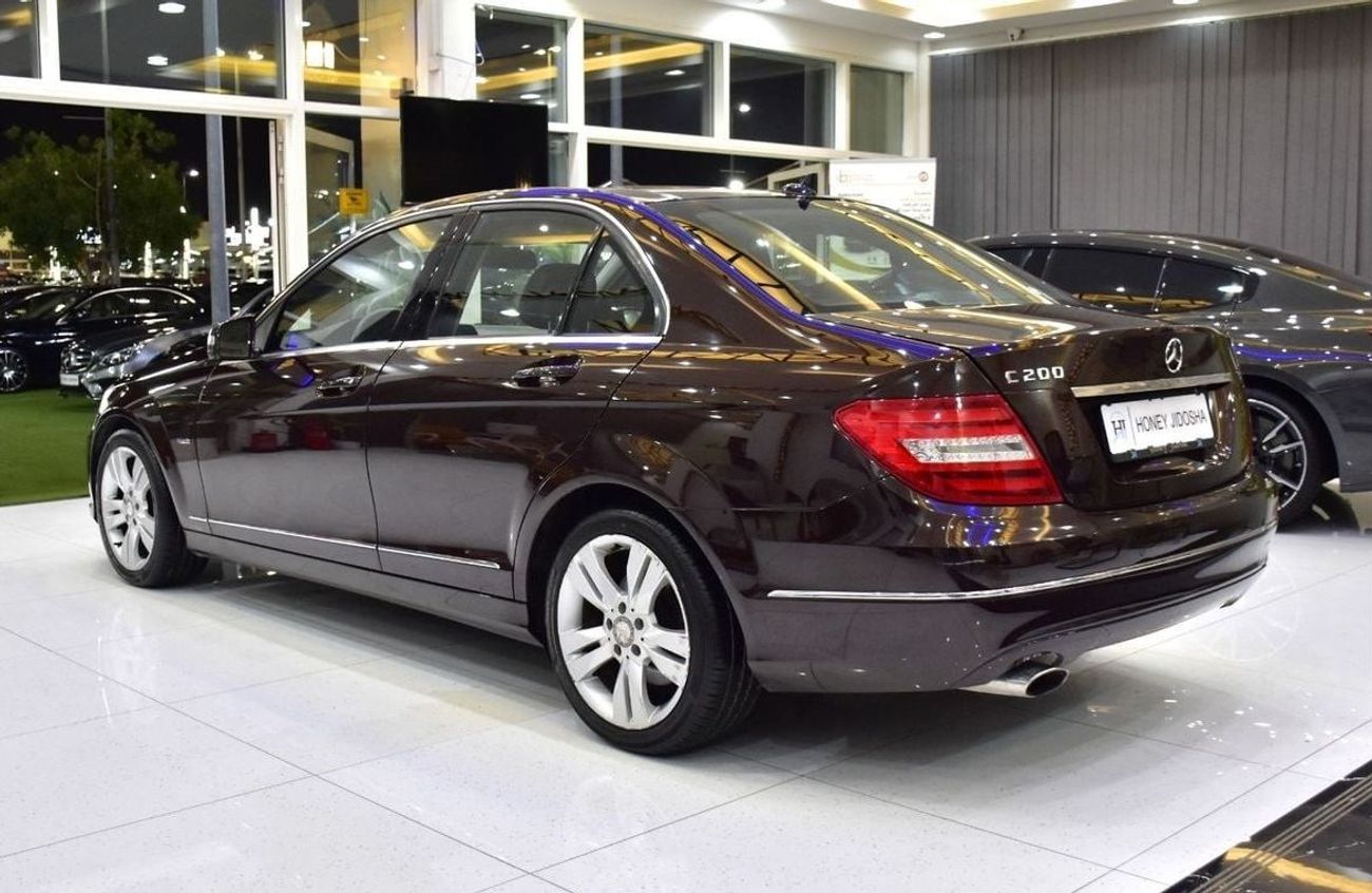 Mercedes-Benz C 200 EXCELLENT DEAL for our Mercedes Benz C200 ( 2012 Model ) in Burgundy Color GCC Specs