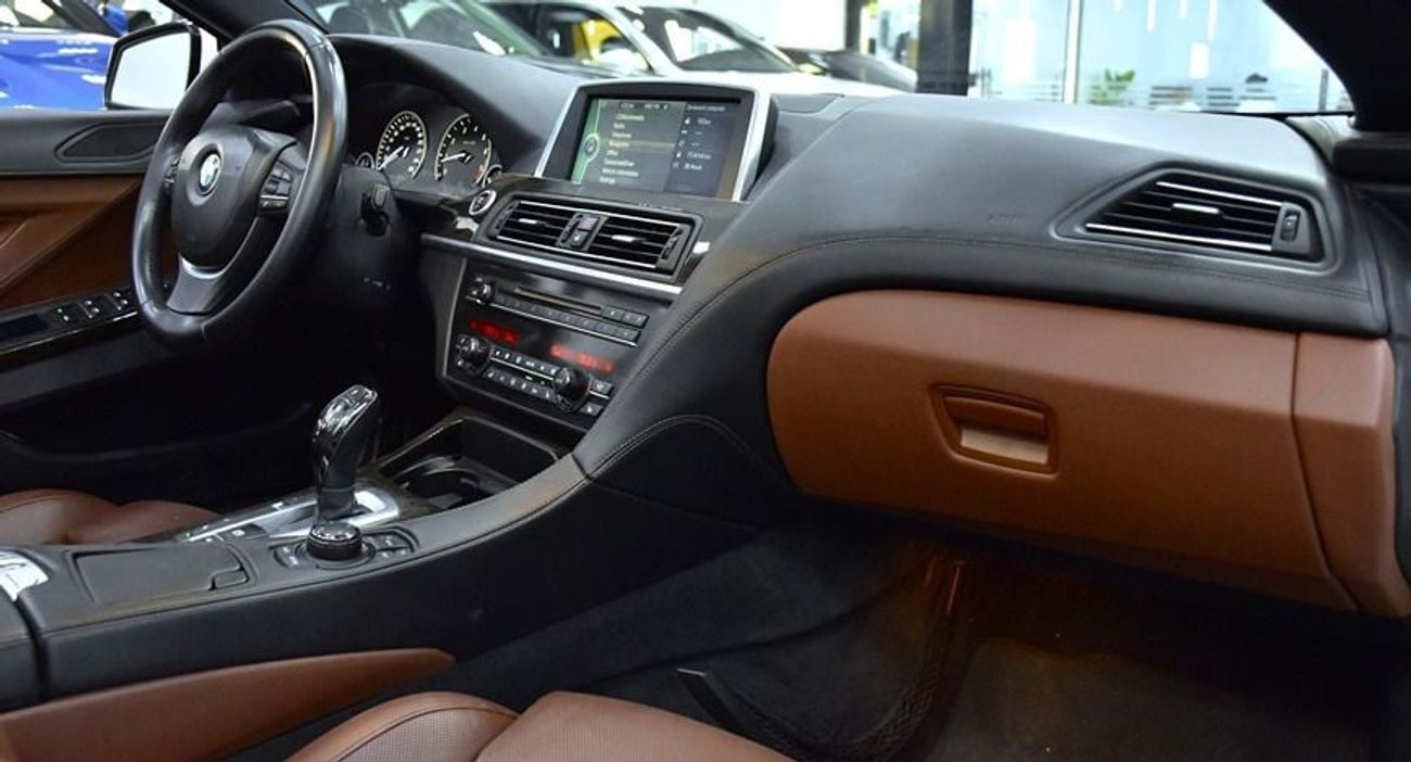 BMW 650i EXCELLENT DEAL for our BMW 650i CONVERTIBLE ( 2011 Model ) in White Color GCC Specs