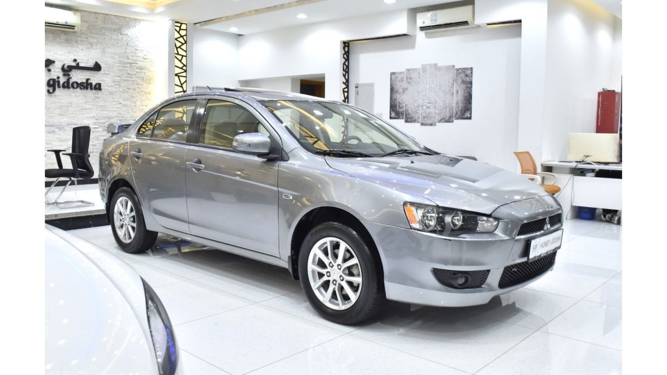 Mitsubishi Lancer EXCELLENT DEAL for our Mitsubishi Lancer GLS ( 2016 Model ) in Silver Color GCC Specs