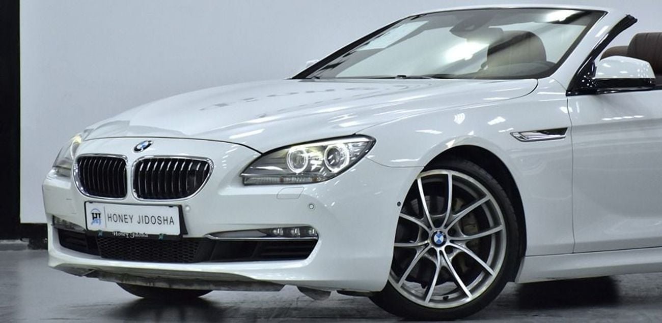 BMW 650i EXCELLENT DEAL for our BMW 650i CONVERTIBLE ( 2011 Model ) in White Color GCC Specs