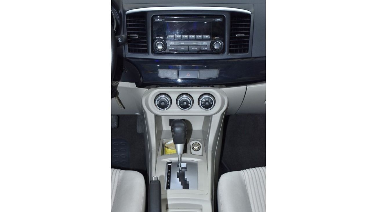 Mitsubishi Lancer EXCELLENT DEAL for our Mitsubishi Lancer GLS ( 2016 Model ) in Silver Color GCC Specs