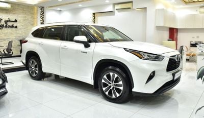 Toyota Highlander GLE HEV EXCELLENT DEAL for our Toyota Highlander Hybrid GLE ( 2023 Model ) in White Color GCC Specs