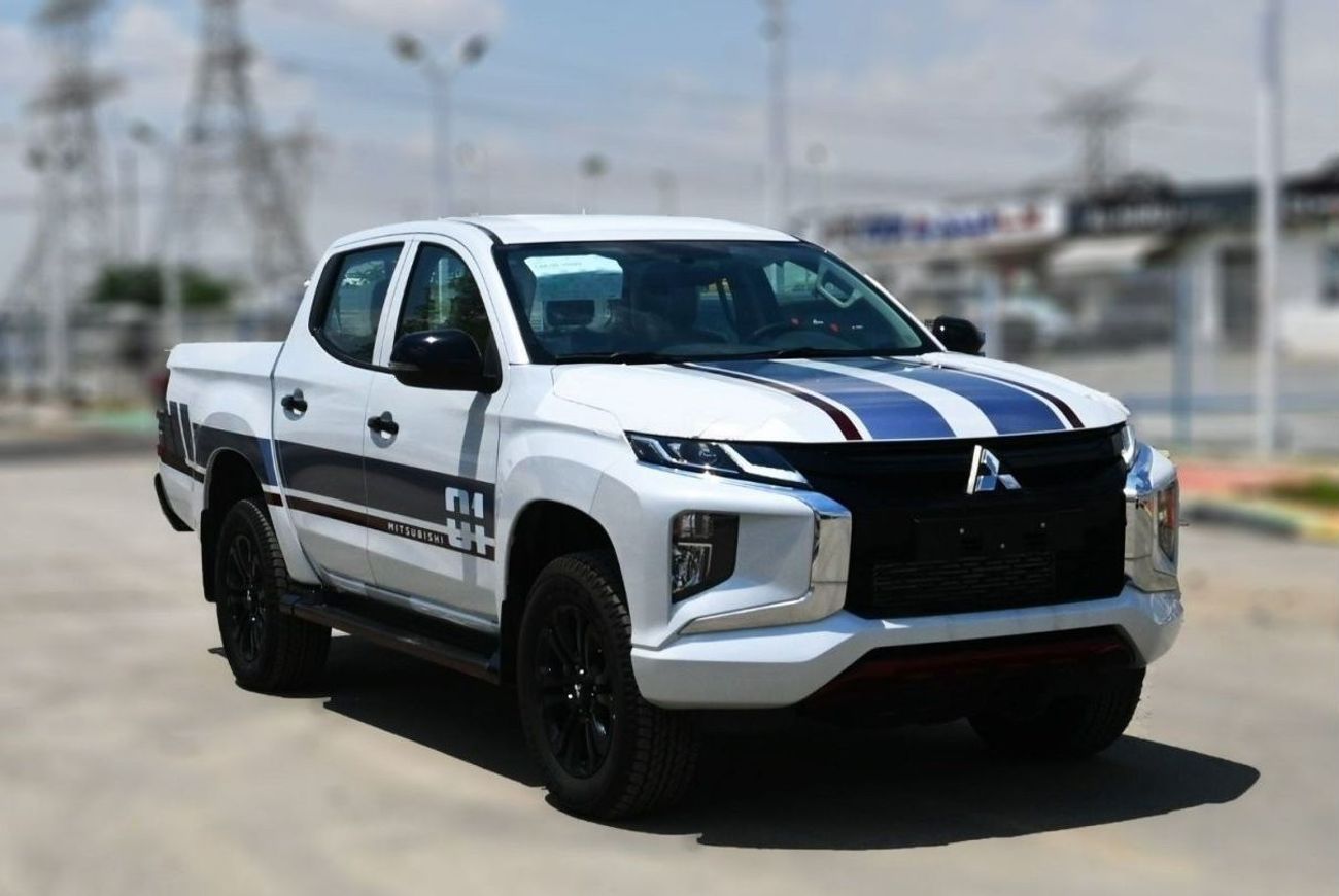 ميتسوبيشي L200 ميتسوبيشي L200 ديزل فل أوبشن أوتوماتيك 2.4 لتر أبيض من الخارج أسود من الداخل