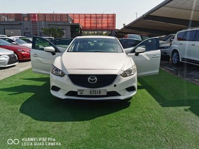 Mazda 6 4-cylinder, accident-free.