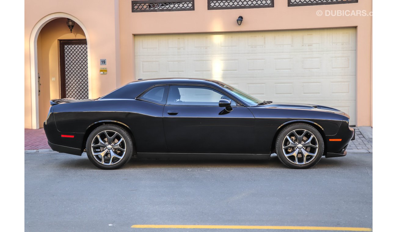 Dodge Challenger 2016 GCC under Warranty with Zero Down-Payment.