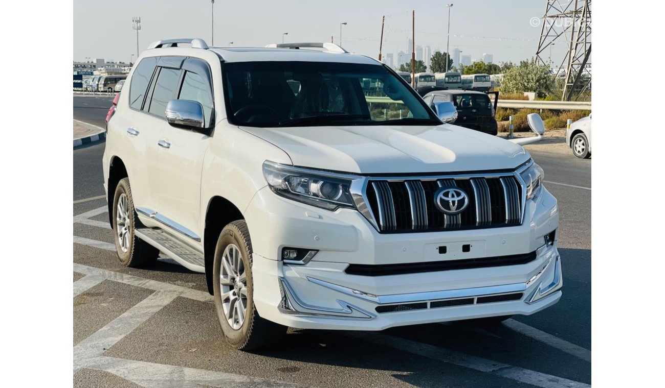 تويوتا برادو Toyota prado Diesel engine 2.7 model 2017 from japan white color 7 seater car very clean and good co