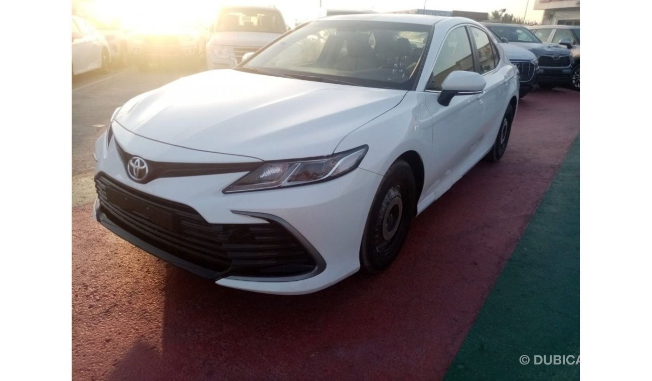 Toyota Camry LE 2022  White inside beige 2.5L petrol 4 Cylinder