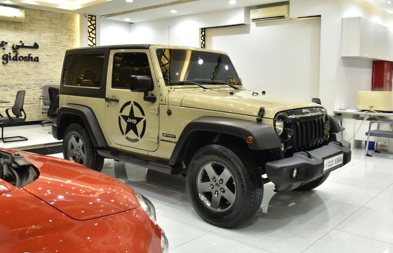 Jeep Wrangler SPORT EXCELLENT DEAL for our Jeep Wrangler Sport ( 2017 Model ) in Beige Color GCC Specs