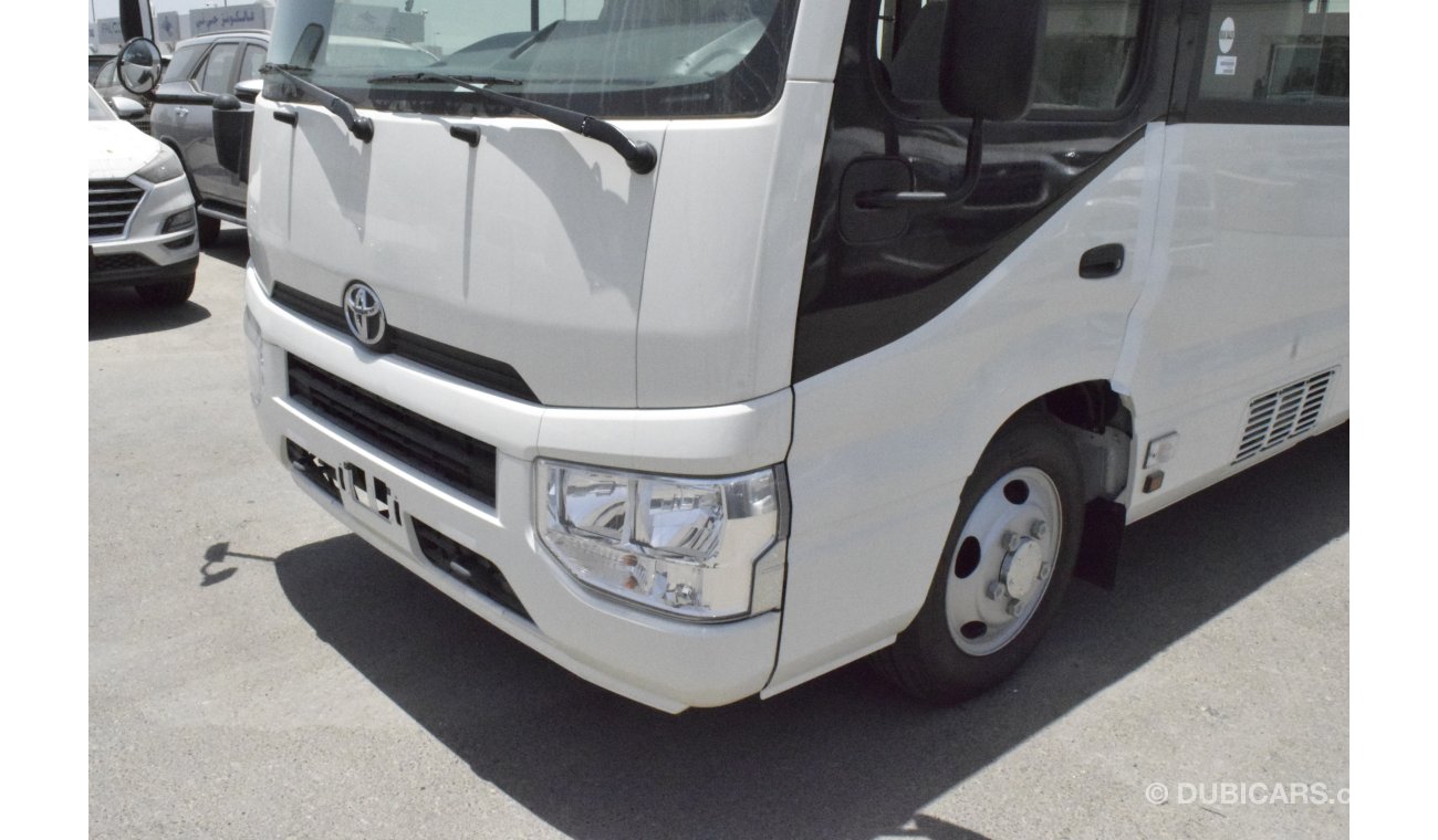 Toyota Coaster 23 SEATER 4.0L ENGINE DIESEL WITH AUTOMATIC ORIGINAL AC , DRIVER AND PASSENGER AC ONLY FOR EXP