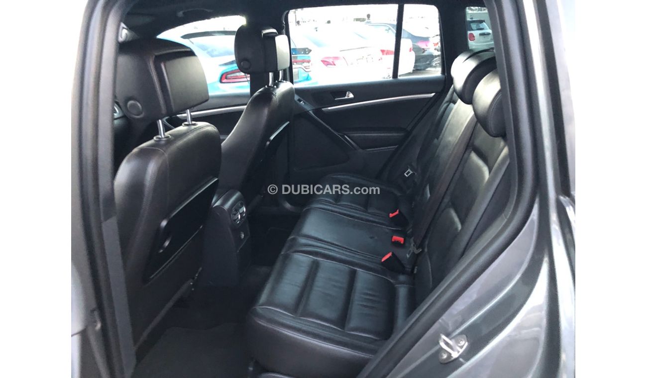 فولكس واجن تيجوان موديل 2014 خليجي فل مواصفات كراسي جلد ومثبت سرعه وتحكم كهربي كامل ونظام صوت ممتاز وكاميرا خلفيه