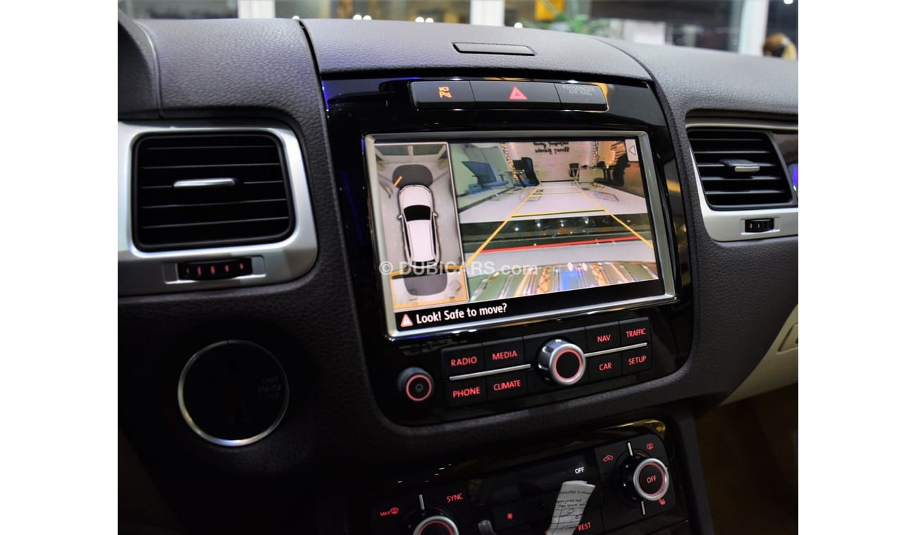 Volkswagen Touareg SEL EXCELLENT DEAL for our Volkswagen Touareg ( 2015 Model! ) in Blue Color! GCC Specs