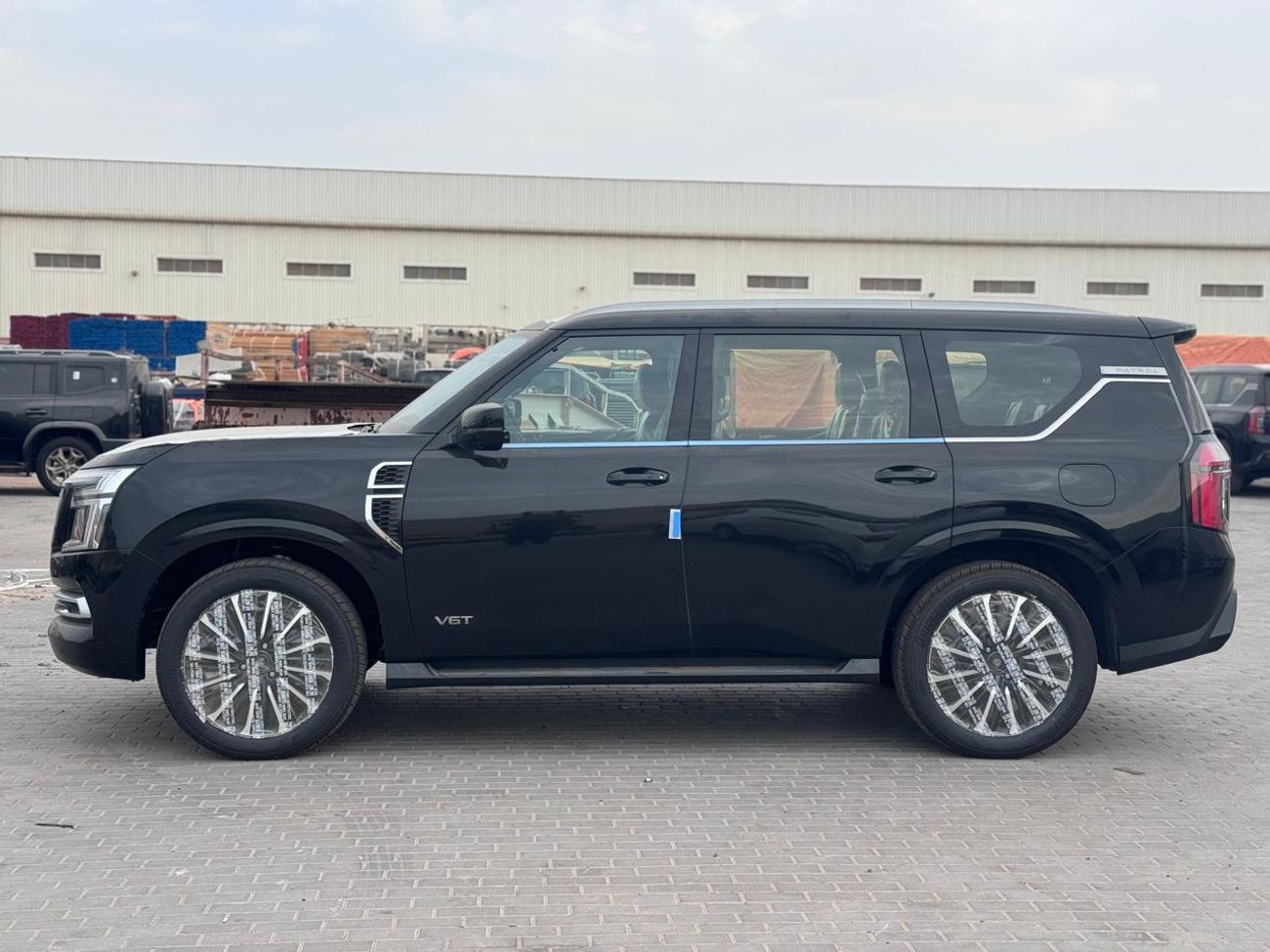 Nissan Patrol LE PLATINUM CITY 3.5L_ 2026_ (BLACK _BURGUNDY)