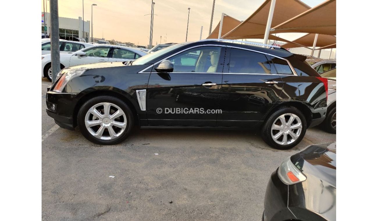 Cadillac SRX 2014 model GCC specs full options panorama clean car 3.6ltr