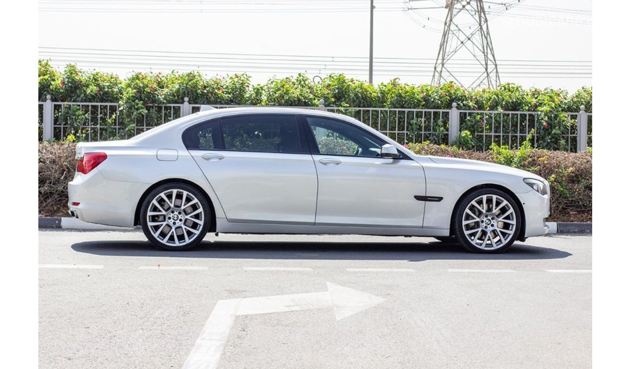 BMW 750Li BMW 750LI - 2012 - GCC - ASSIST AND FACILITY IN DOWN PAYMENT - 1520 AED/MONTHLY