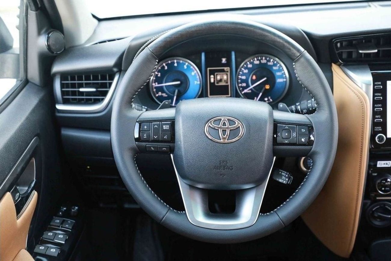 تويوتا فورتونر 2024 Toyota Fortuner GXR 4.0 - PLATINUM WHITE PEARL inside TAN | Export Only