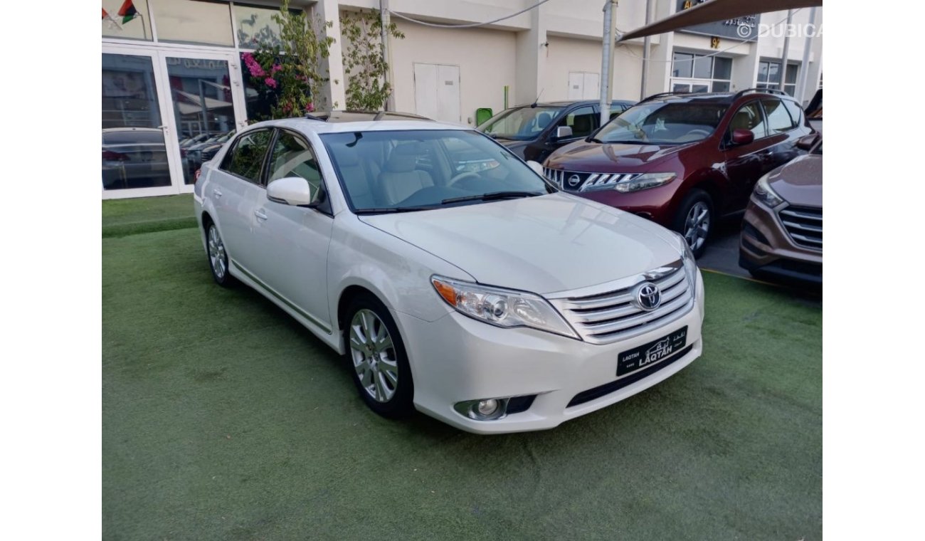 Toyota Avalon 2011 model, leather hatch, cruise control, sensor wheels, in excellent condition