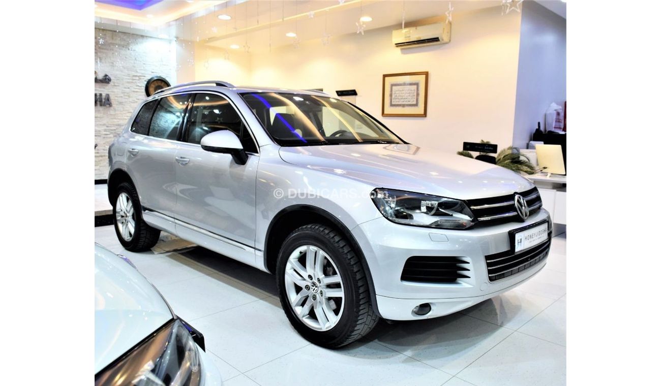 Volkswagen Touareg WITH SERVICE HISTORY Volkswagen Touareg 2011 Model! GCC Specs Silver Color!