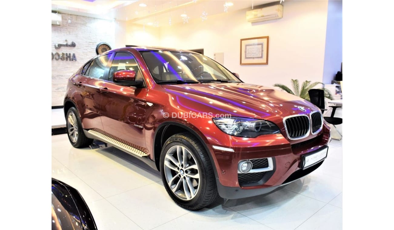 مستعملة بي أم دبليو X6 ( ONLY 53000KM ) AMAZING BMW X6 2014 Model!! in Maroon Color! GCC Specs