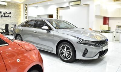 Kia K5 EXCELLENT DEAL for our KIA K5 ( 2023 Model ) in Silver Color GCC Specs