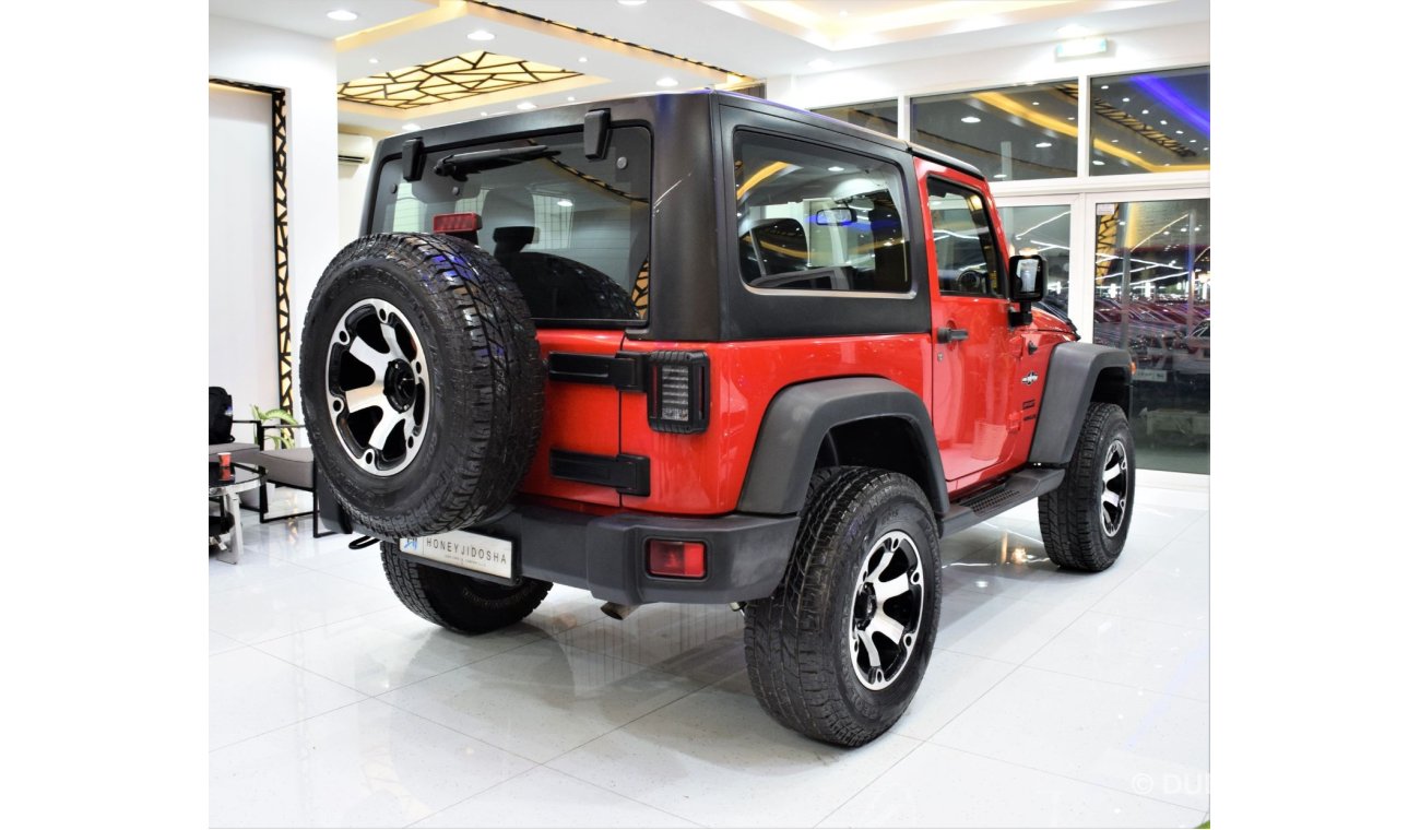 Jeep Wrangler Sport EXCELLENT DEAL for our Jeep Wrangler Sport ( 2015 Model! ) in Red Color! GCC Specs