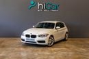 BMW 120i STD AED 765  P.M • 0% Downpayment • BMW 120i Sport-line • 1 Year Warranty