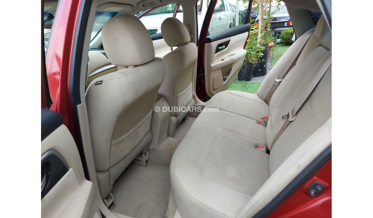 Nissan Altima 2014 model, American import, burgundy color, inside beige, cruise control, in excellent condition, y