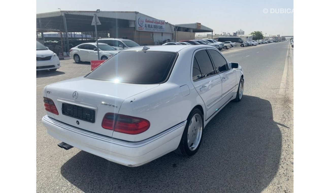 Mercedes-Benz E 320 1998 American model, 6-cylinder kit AMG 55, white inside beige, mileage 198000