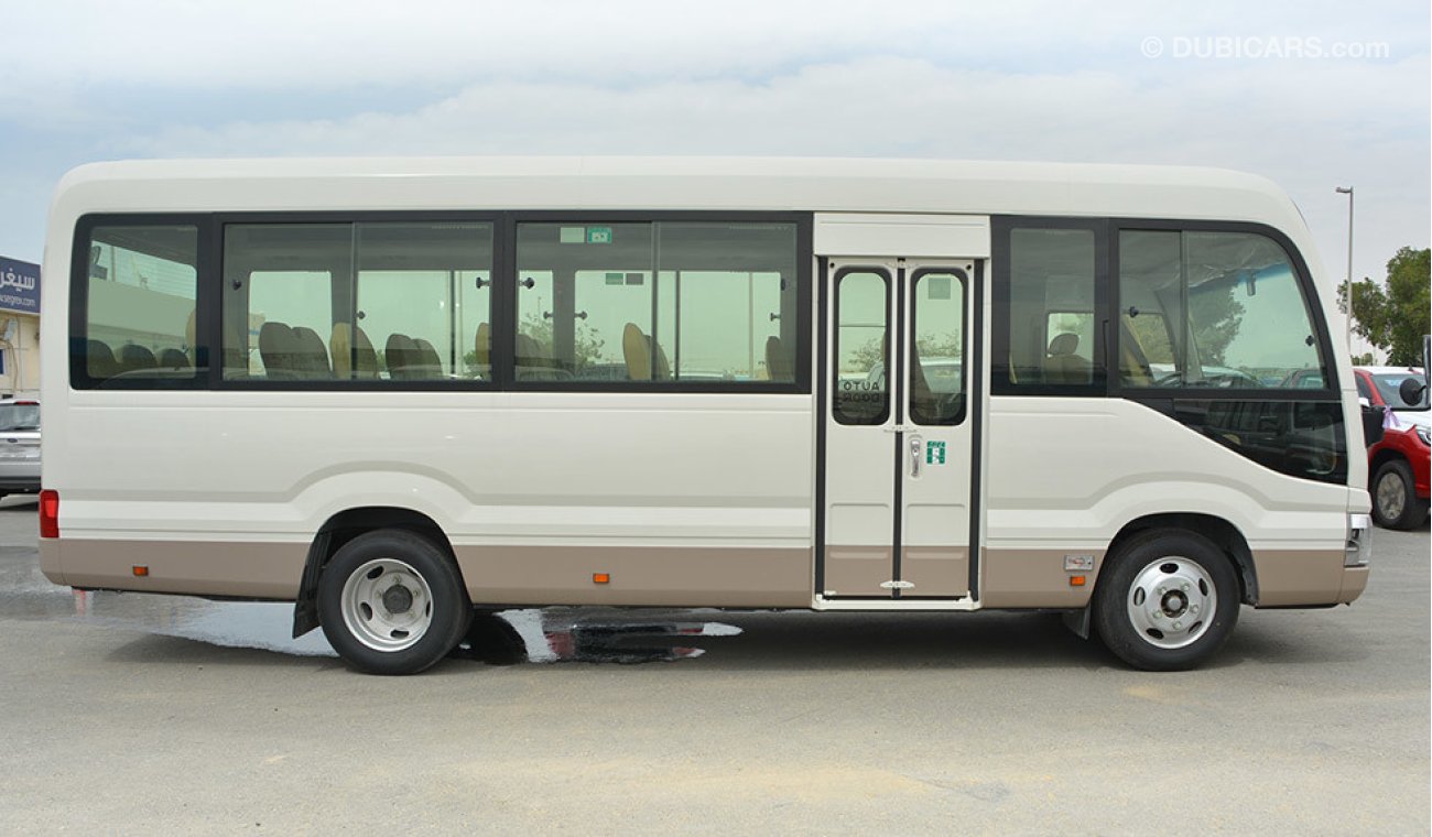 Toyota Coaster 4.2 High Roof 23 seats