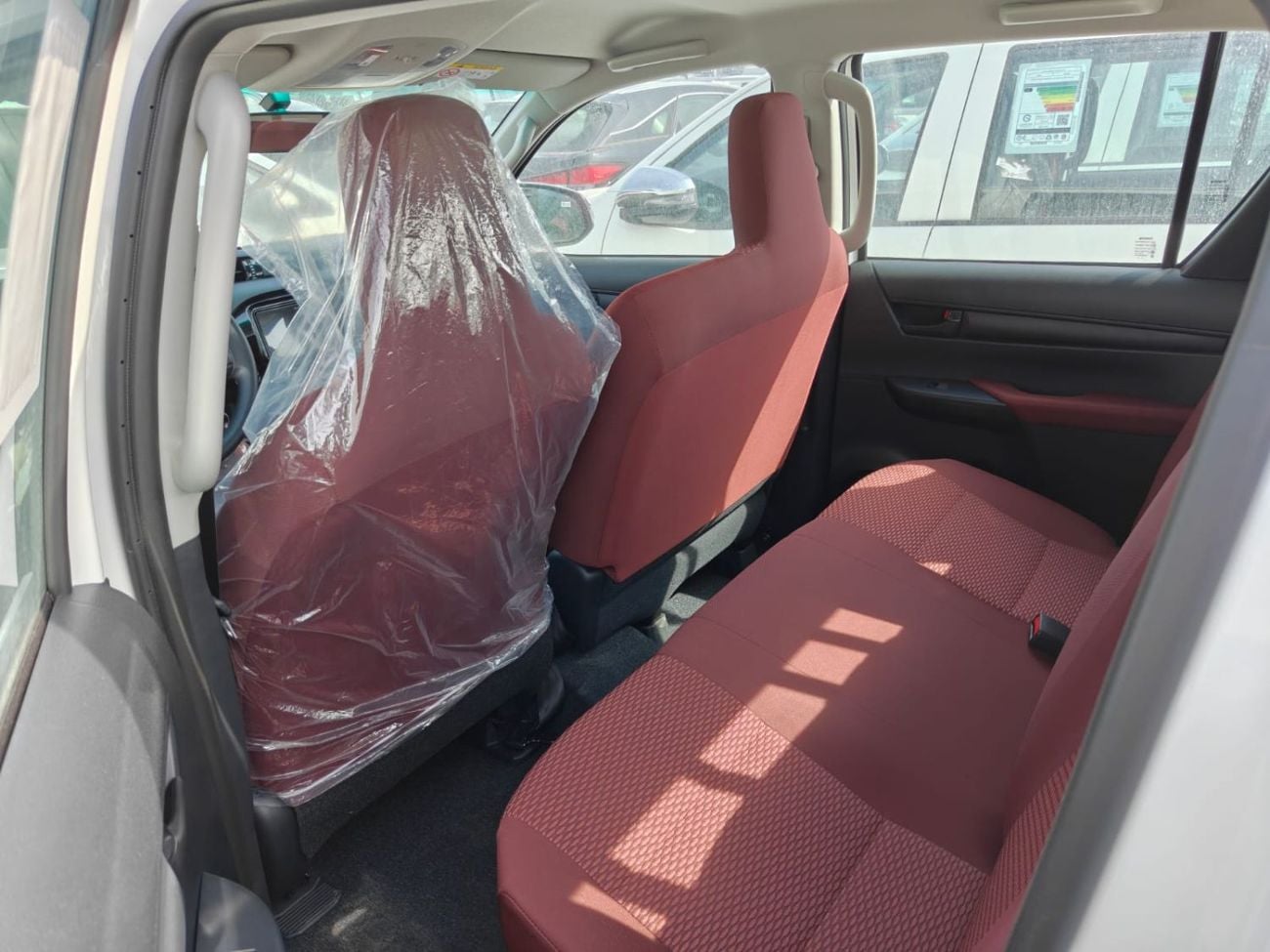 تويوتا هيلوكس 2026 Toyota Hilux white/red 2.4L diesel manual GCC spec mid option