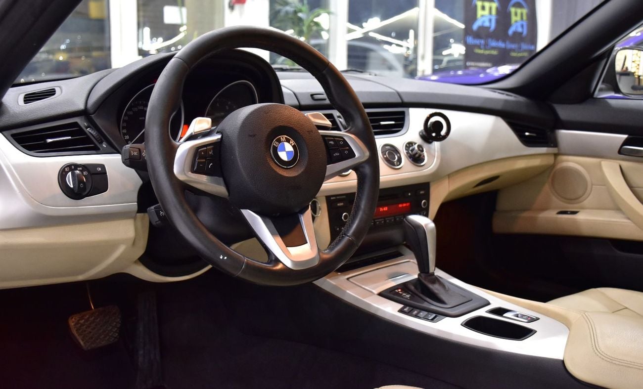 BMW Z4 sDrive 23i EXCLUSIVE EXCELLENT DEAL for our BMW Z4 sDrive23i ( 2012 Model ) in Brown Color GCC Specs