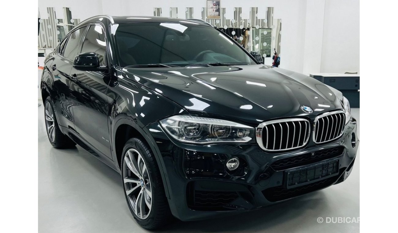 BMW X6 50i Exclusive GCC .. FSH .. M kit .. Perfect Condition .. V8