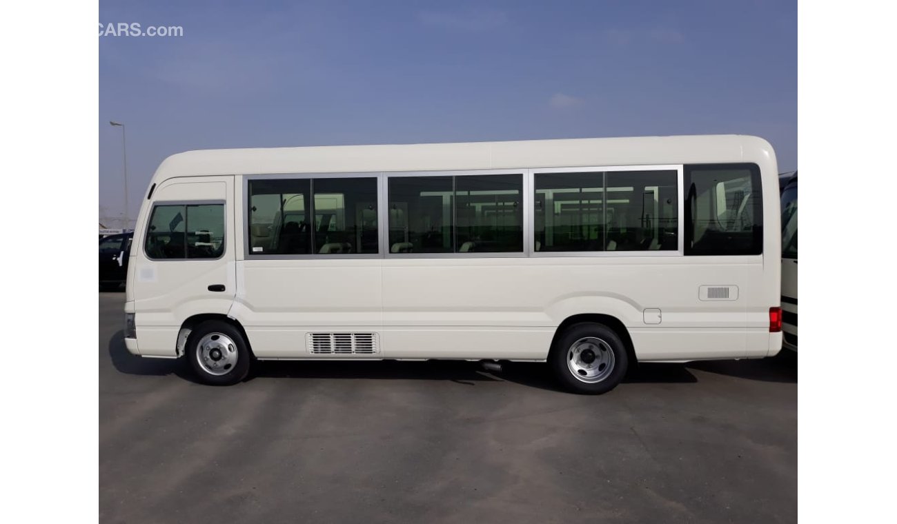 Toyota Coaster DIESEL 4.2L WITH AIR BAGS ABS AND POWER DOOR