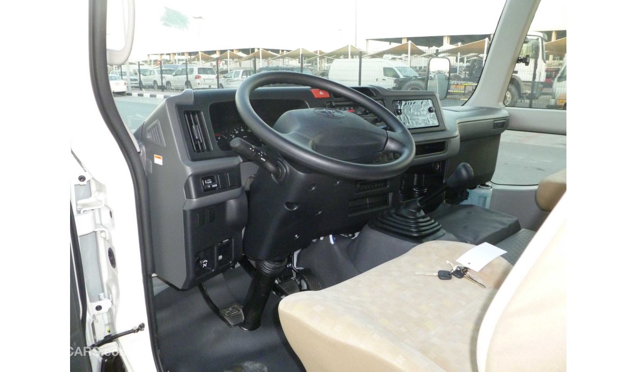 Toyota Coaster LHD -  4.2L DIESEL HIGH ROOF DSL MANUAL