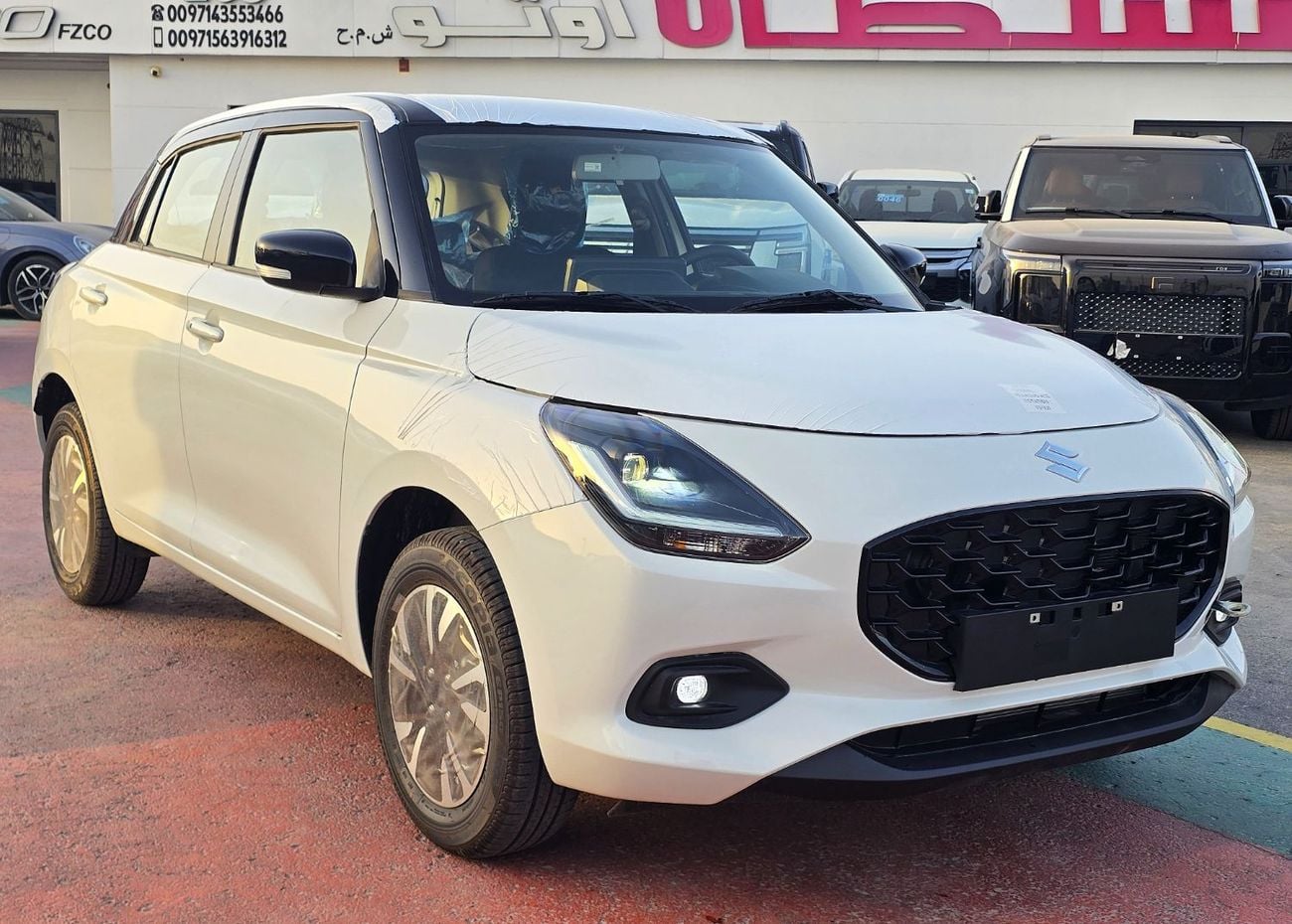 Suzuki Swift Suzuki Swift GLX 1.2L Two Tone White color with black roof  2026 model