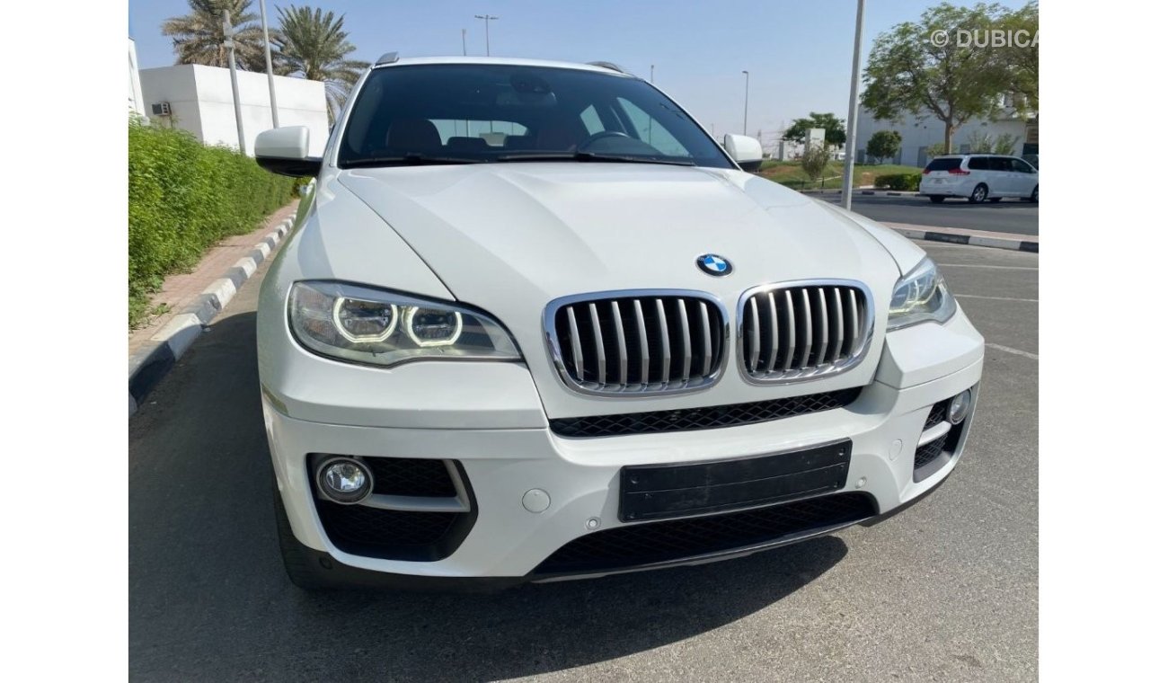 BMW X6 AED2070/month | 2014 BMW X6 XDrive50i 4.4L UNLIMITED K.M WARRANTY.