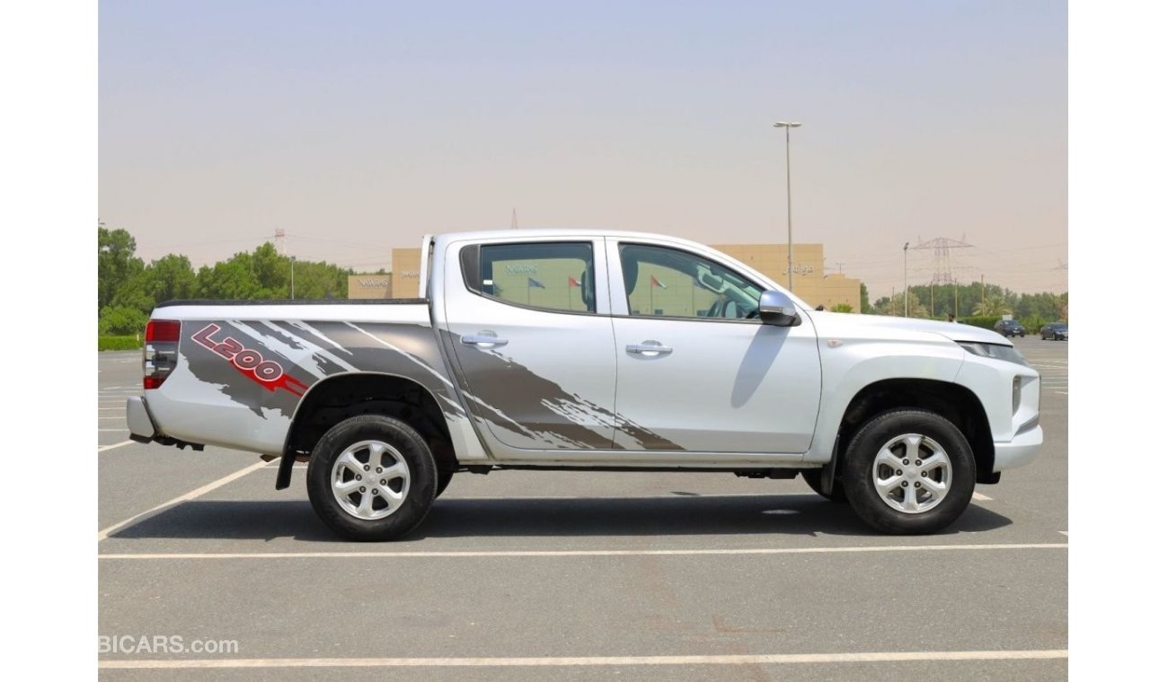 Mitsubishi L200 | 4x4 | Power Locks, Windows, Mirror | Petrol Engine | Excellent Condition | GCC